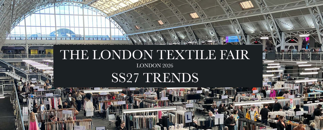 image of exhibition space with black box and white text about the London textile fair and SS27 trends
