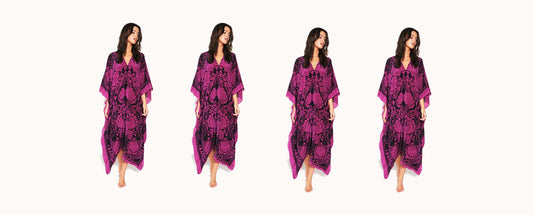 4 women standing in a line wearing a pink kaftan, face looking to the side and matching