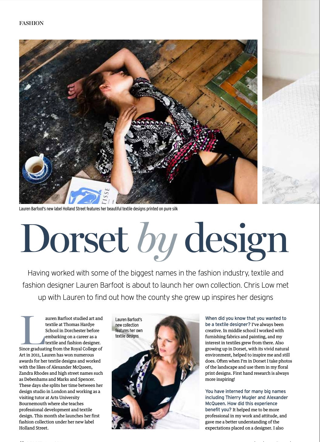 Lauren Barfoot in her design studio, surrounded by printed silk kaftans from her Holland Street collection—luxury loungewear inspired by Dorset’s natural landscape and crafted with sustainable British textiles.