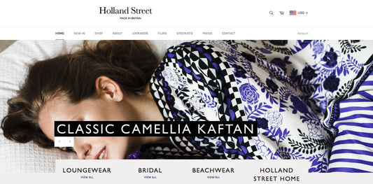 A snapshot of the Holland Street Website.Holland Street Customer lying down where a silk kaftan