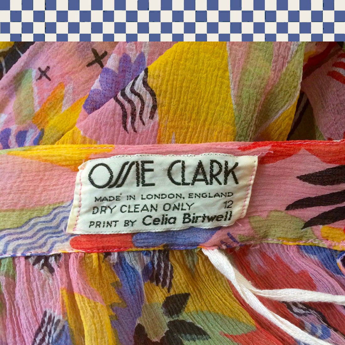 Ossie Clark and Celia Birtwell with flowing silk printed kaftans featuring Birtwell’s whimsical floral textiles. The scene evokes 1970s British fashion, with designs later inspiring Holland Street collections and iconic prints like Mystic Daisy.