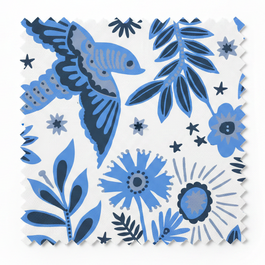 A hand‑drawn Holland Street “Park Life” pattern printed on linen and wallpaper, featuring birds, boats, and flowers in fresh blue, navy, and grey tones, designed in Britain.